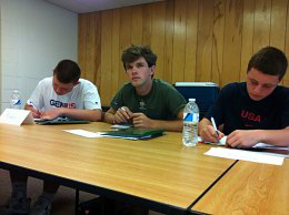 Rob, Patrick and Johnny taking notes.